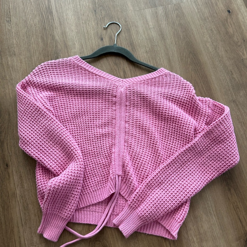 Pink sweater with scrunch in middle